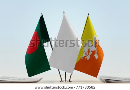Flags of Bangladesh and Bhutan with a white flag in the middle