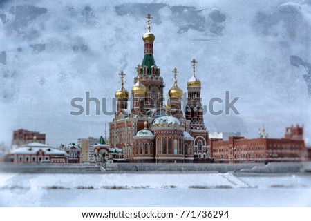 The Cathedral of the Annunciation of the Blessed Virgin on the shore of the winter river. City landscape