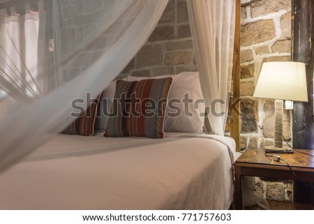 bed with mosquito net