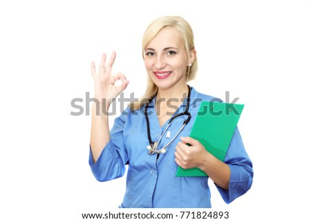 A happy woman doctor shows a hand gesture perfectly. Isolated on white background