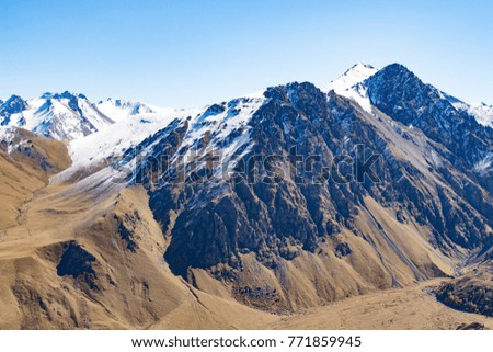 Landscape panorama caucasus mountain with autumn hills daytime