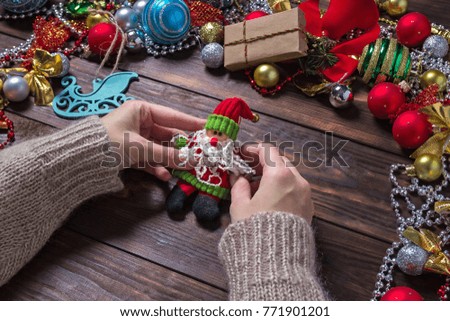 Christmas gifts handmade. Dark wooden background. Top view. Making New Year decoration. Christmas ornaments.