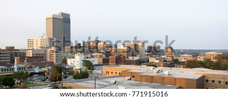 The urban landscape of downtown Omaha Nebraska just before sunset
