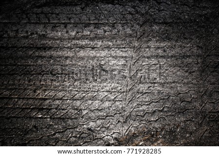 Tyre track on dirt sand or mud, retro tone, grunge tone, drive on sand, off road track
