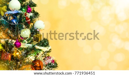 Tree and Christmas decorations. Beautiful decorated with present boxes in a winter landscape with snow. 