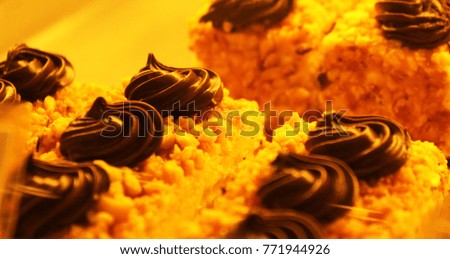 This is a picture of some chocolate topped Cakes. This can be used for wallpaper, backgrounds, web design and various purposes.