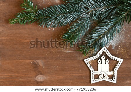 Christmas holiday background. Decoration on a wooden background with fir tree branches