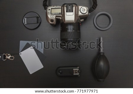 top view of work space photographer on black table background
