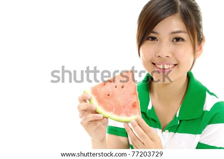 close up of pretty girl eating a fresh watermelon