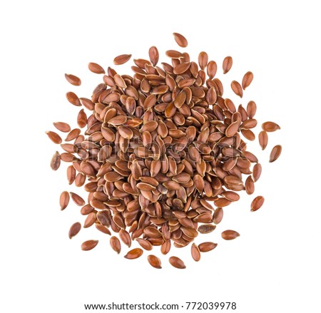 Pile of flax seeds isolated on white background close-up, top view Royalty-Free Stock Photo #772039978