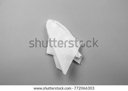 White tissues on gray background Royalty-Free Stock Photo #772066303