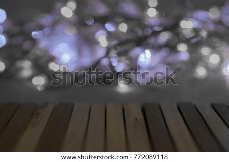 The bokeh is the background to the wooden floor at the front.