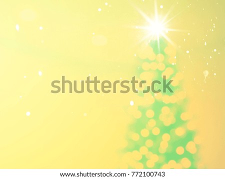 Picture of christmas lights on tree, out of focus with copy space
