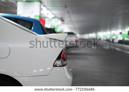 Close-up on cars inside underground parking lot