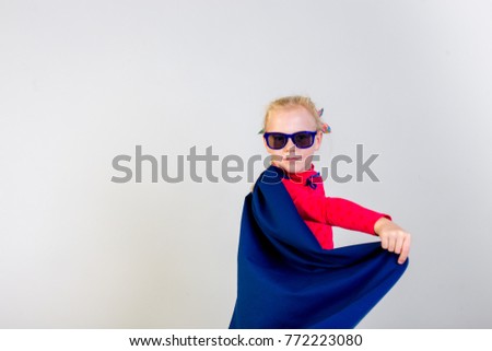 Girl dressed as a superhero