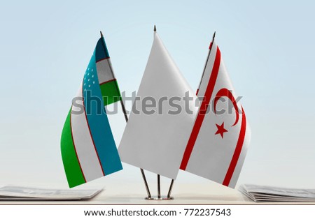 Flags of Uzbekistan and Northern Cyprus with a white flag in the middle