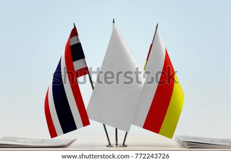 Flags of Thailand and South Ossetia with a white flag in the middle