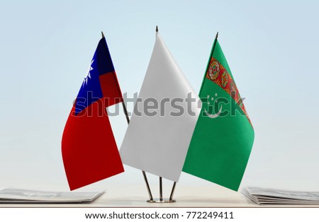 Flags of Taiwan and Turkmenistan with a white flag in the middle