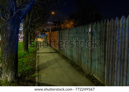 Street in a neighborhood by night
