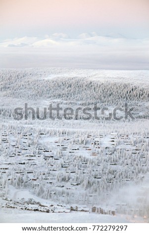 Winter sunrise in the ski resort of Trysil, Norway. The picture was taken from the bottom of the mountain.