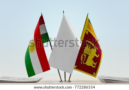 Flags of Kurdistan and Sri Lanka with a white flag in the middle