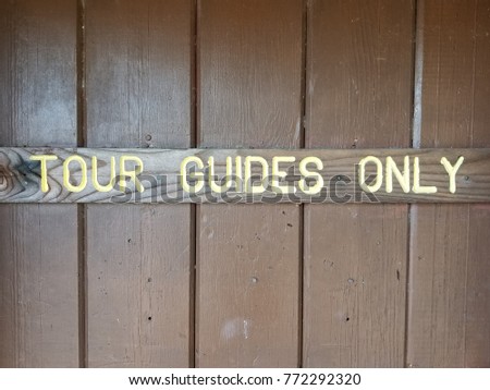 Tour Guides Only sign on door