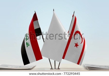 Flags of Iraq and Northern Cyprus with a white flag in the middle