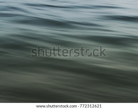 Waves pattern in the dark ocean for nature and background.