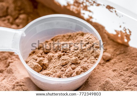 Sport and diet nutrition equipment on stone background