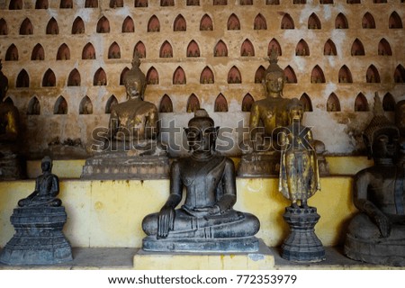 Buddha meditation with Buddha statue in background
