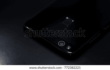 luxury smartphone on a black background gloss