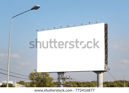 Blank billboard on blue sky background for new advertisement.
