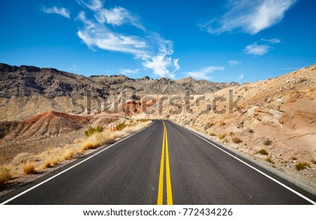 Scenic desert road, travel concept picture, Valley of Fire State Park, Nevada, USA.