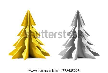 Origami Christmas tree with gold and silver paper isolated on white background for decoration, front view.