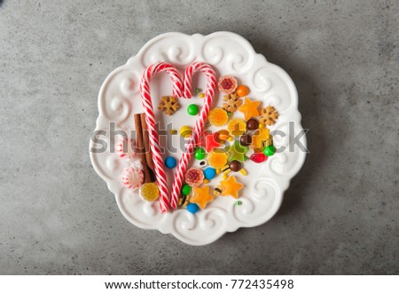 colored candies on a white plate