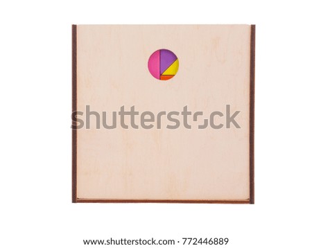 Wooden box for children's geometric shapes, with a hole isolated on white background.