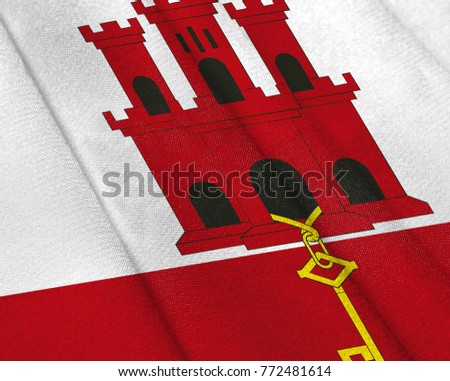 Realistic flag of Gibraltar on the wavy surface of fabric