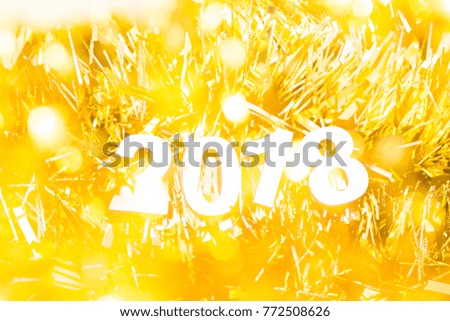 Happy new year 2018 with festive gold glitter background