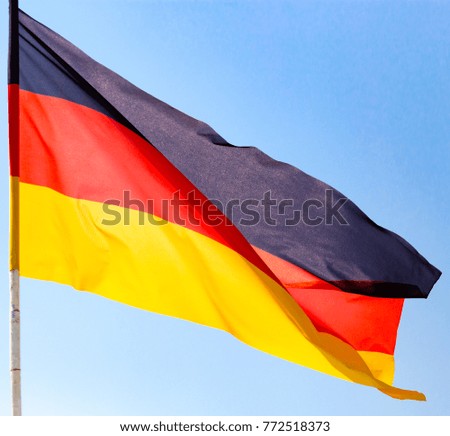 Flag of Germany against the blue sky
