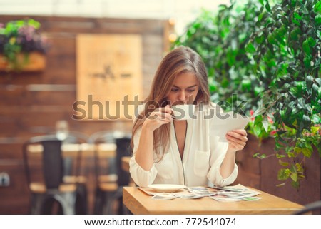 Beautiful young girl with coffee