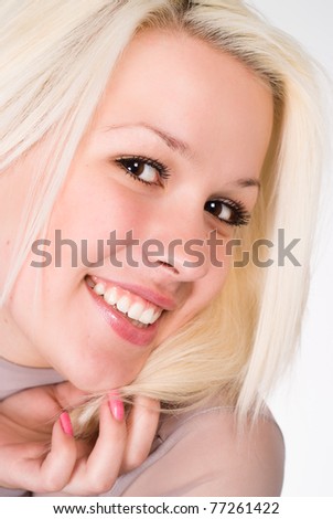 woman in a grey clothes on a white background