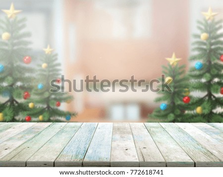 Christmas tree with top wood table and Blur background before Christmas day