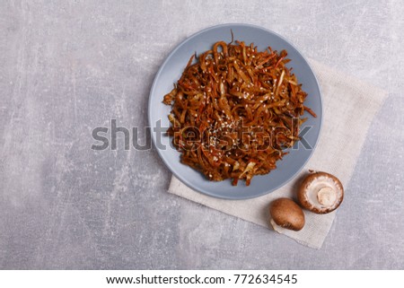 Chinese noodles and sea food on the marble background. Food concept.