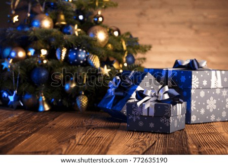 Christmas background. Blue and gold esthetics.