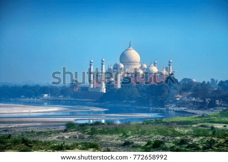 Agra, Uttar Pradesh, India, January 19, 2011 : A panoramic view of the Taj Mahal with Yamuna River, seen from the Red fort or Agra Fort