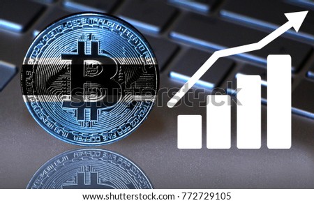 Bitcoin close-up on the keyboard background, the Botswana flag is shown on the bitcoin.
