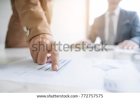two business executives friendship at a cafe or working space and discussing a project