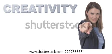 Business Woman pointing the text CREATIVITY Business Concept.