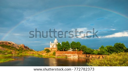 Amazing view on Jaswant Thada mausoleum after the rain with a rainbow in the sky. Location: Jodhpur, Rajasthan, India. Artistic picture. Beauty world. 