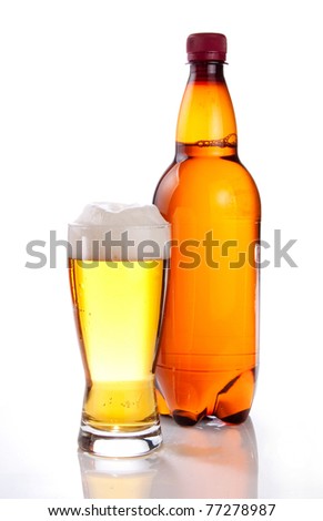 Beer in plastic bottle and glass on a white background